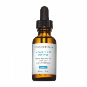 Braunes Glasfläschchen mit einer Pipette, etikettiert mit 'Blemish + Age Defense' von SkinCeuticals.