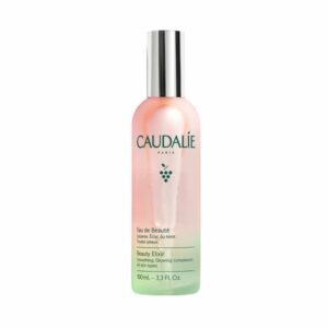 Flasche mit Eau de Beauté von Caudalie, halbtransparent in Pink und Grün, mit silberner Kappe, Inhalt 100ml.