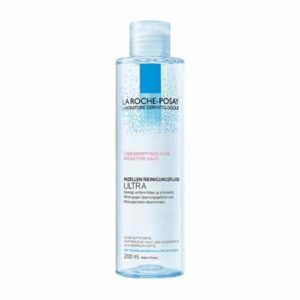 Durchsichtige Flasche mit blauem Deckel, enthält Mizellen-Reinigungsfluid für empfindliche Haut, 200 ml.