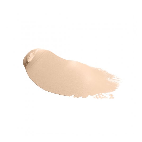 Cremefarbener Makeup-Foundation-Streifen auf weißem Hintergrund, cremige Textur sichtbar.