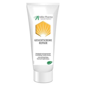 Tube mit Gesichtscreme Repair von Adler Pharma, beschreibt beruhigende Eigenschaften für alle Hauttypen.