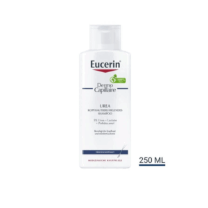 Weißer Shampoo-Flasche mit rot-blauer Beschriftung, enthält 5% Urea und ist für trockene Kopfhaut.