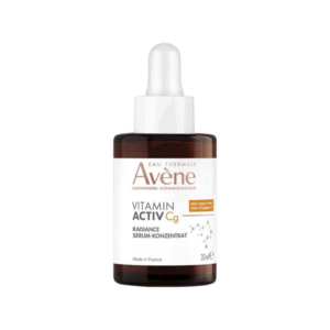 Braunes Fläschchen mit Pipette, Avène Vitamin Activ Cg Radiance Serum, 30 ml, mit weißen und orangefarbenen Details.