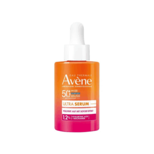 Flasche mit orangefarbenem Serum von Avène, schützt vor UV-Strahlen und enthält Hyaluronsäure und Niacinamid.
