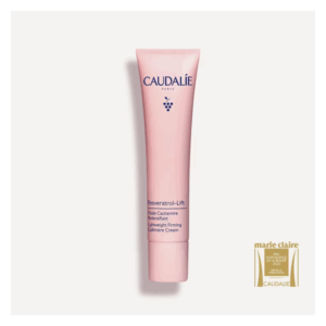 Rosa Tube mit der Bezeichnung Resveratrol-Lift von Caudalie, die eine aufflammende Cashmere-Creme anbietet.