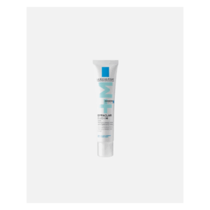 Ein schlanker, weißer Tubus mit blauen Akzenten, beschriftet mit "Effaclar Duo+M" von La Roche-Posay, für Hautpflege.