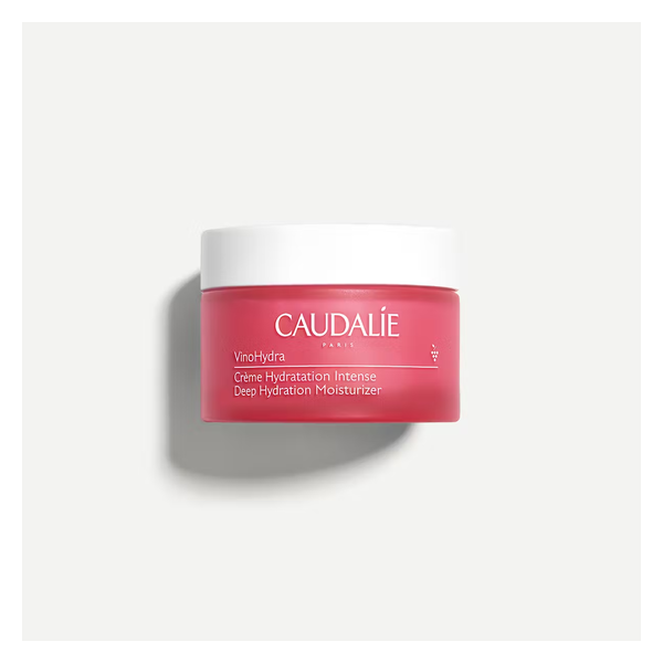 Rosa Cremebecher von Caudalie mit Deckel, auf dem Produktname und Beschreibung stehen.
