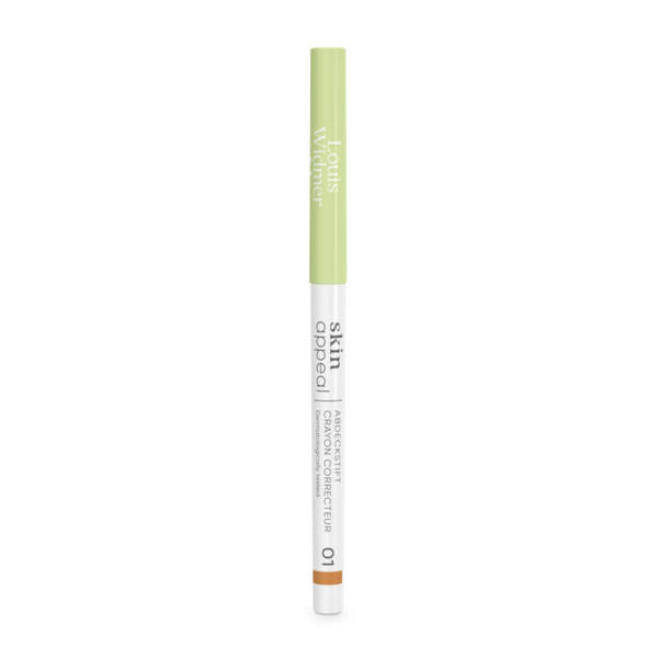 Abdeckstift in Stiftform mit grünem Deckel und weißer Verpackung, zur Korrektur von Hautunreinheiten.
