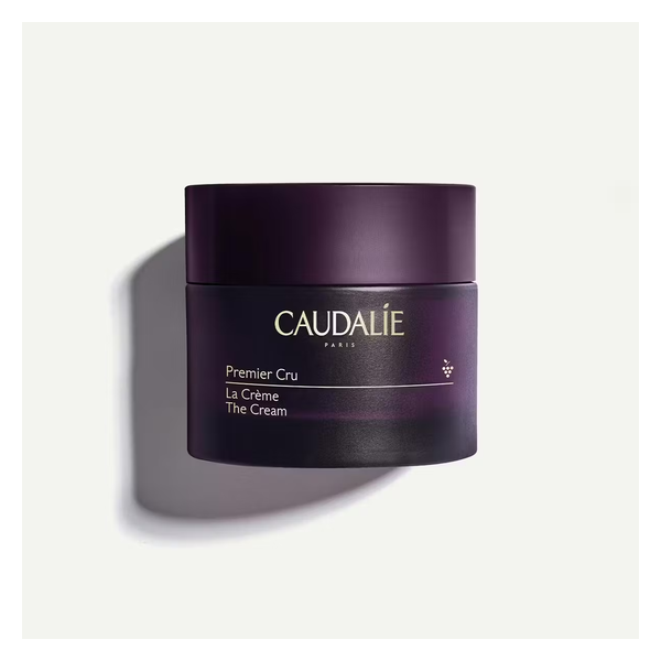 Glitzernde violette Cremedose von Caudalie mit dem Schriftzug Premier Cru La Crème The Cream.