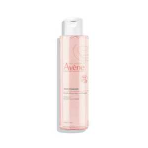 Transparentes Behältnis mit Gesichts-Gel von Avène, geeignet für empfindliche Haut, rosafarbene Flüssigkeit.